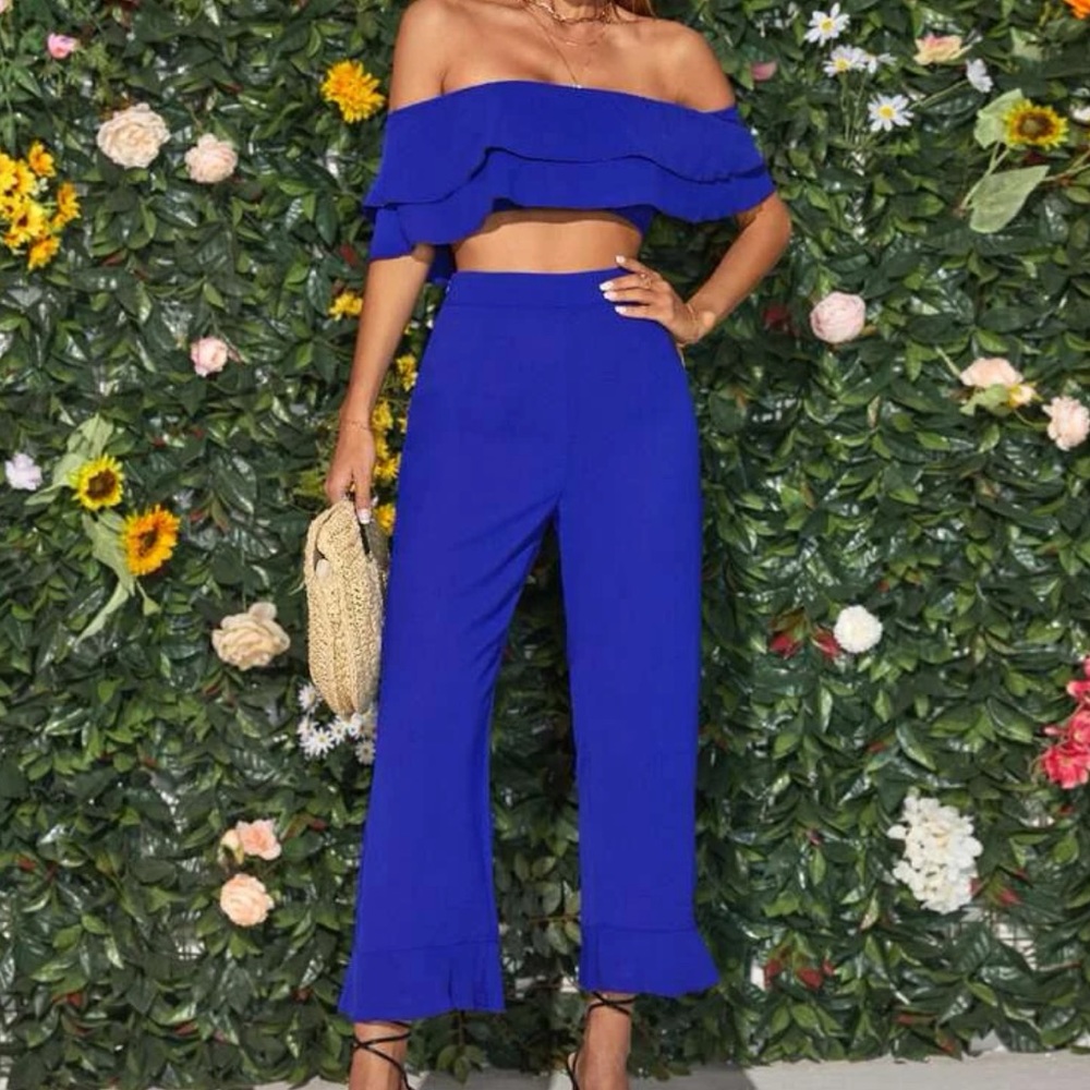 Off the shoulder ruffle crap with ruffle trim pants.